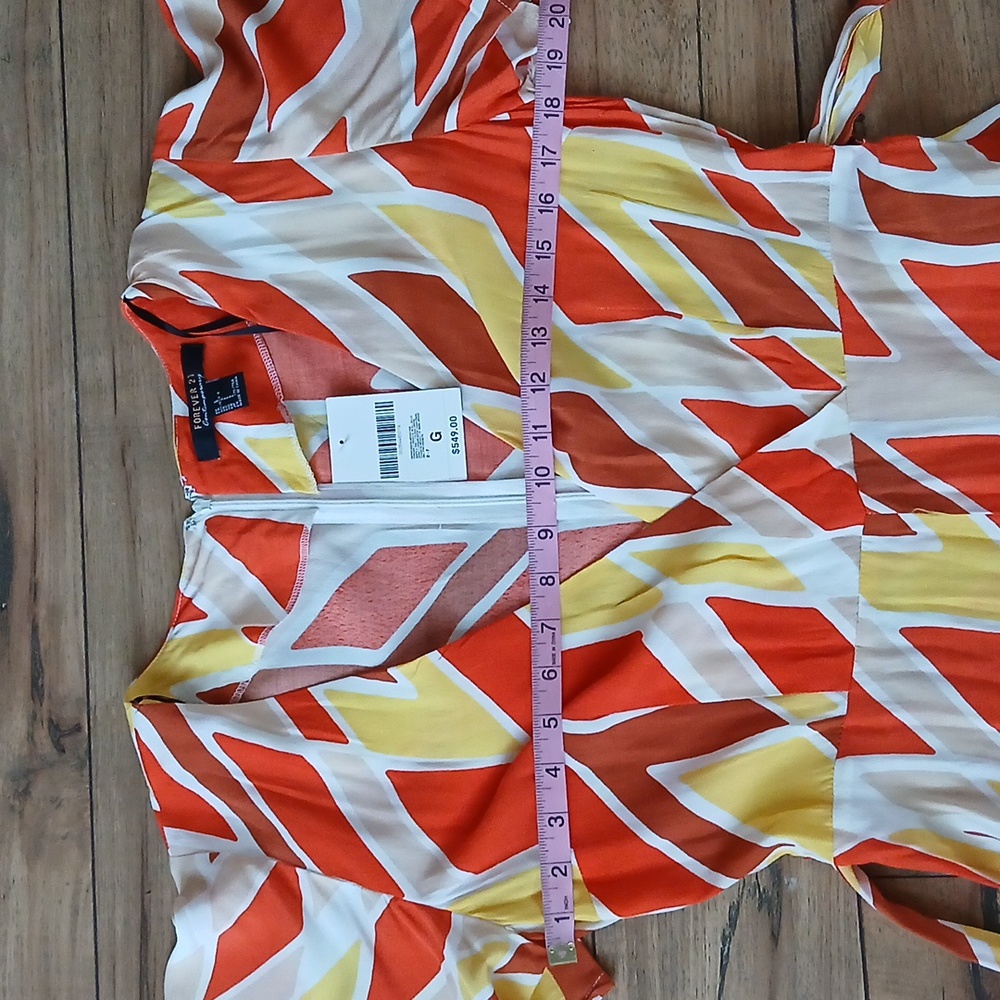 New Vibrant Orange and Yellow Patterned Wrap Mini Rorper. Size L - Picture 17 of 17